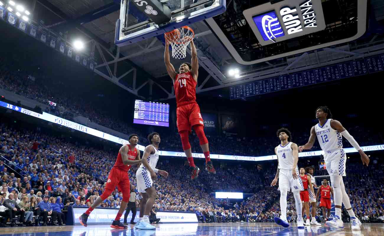 Dwayne Sutton #24 of the Louisville Cardinals shoots the ball against the Kentucky Wildcats at Rupp Arena