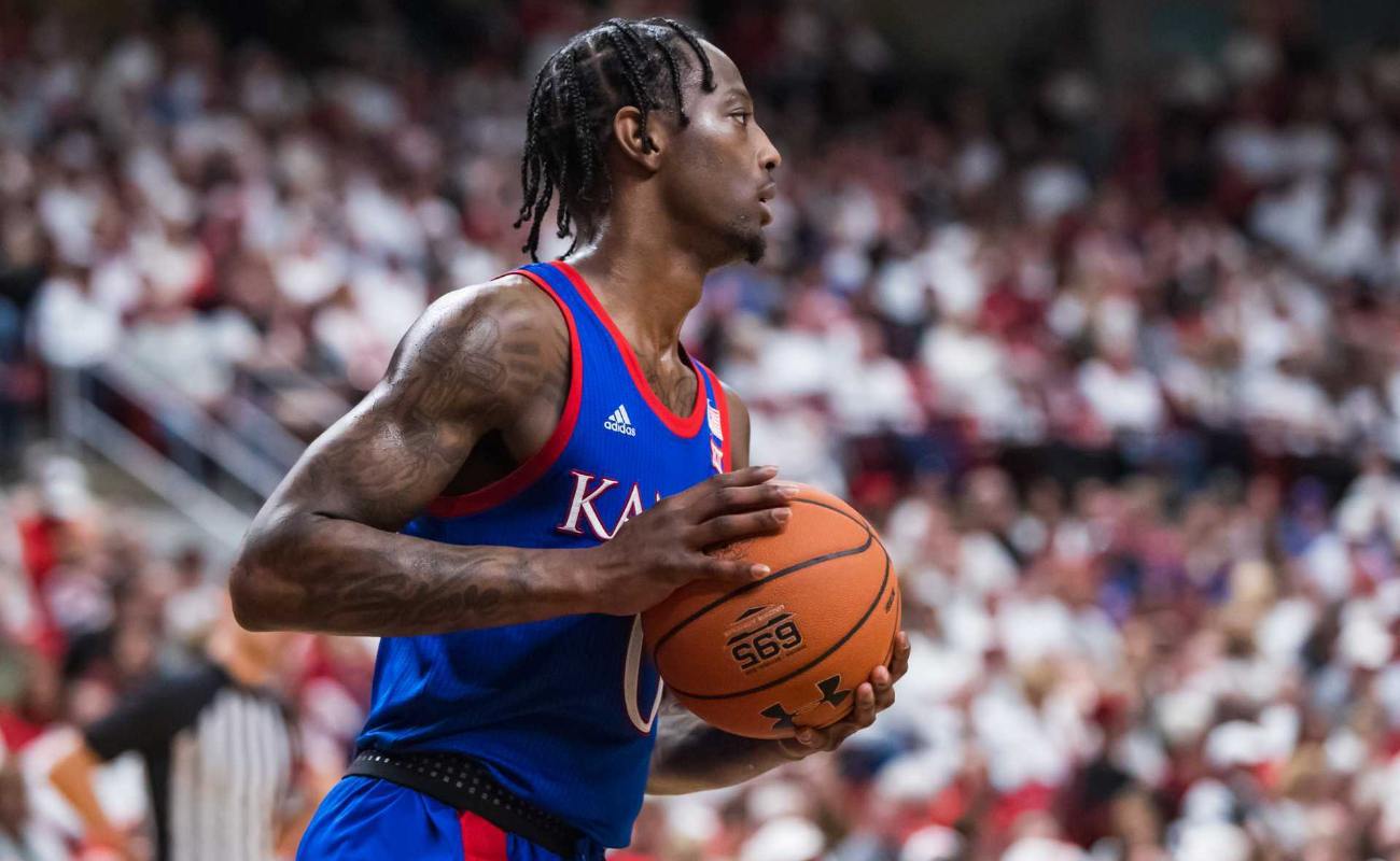 Guard Marcus Garrett of Kansas Jayhawks handles the ball during college basketball game against Texas Tech Red Raiders on March 07, 2020