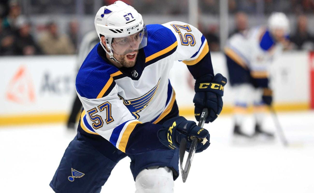 David Perron #57 of the St. Louis Blues looks skates to a loose puck during the second period of a game against the Anaheim Ducks at Honda Center
