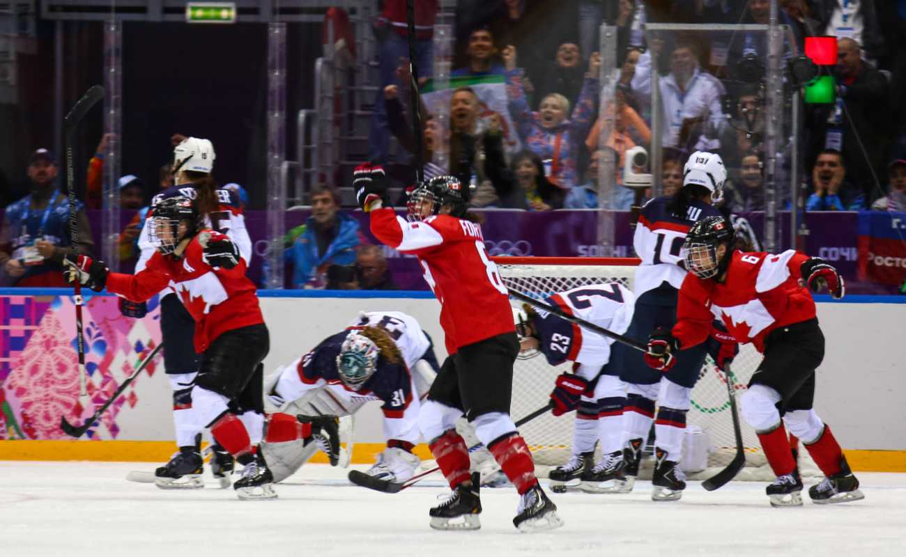 Canadian Ice hockey team celebrating gold medals