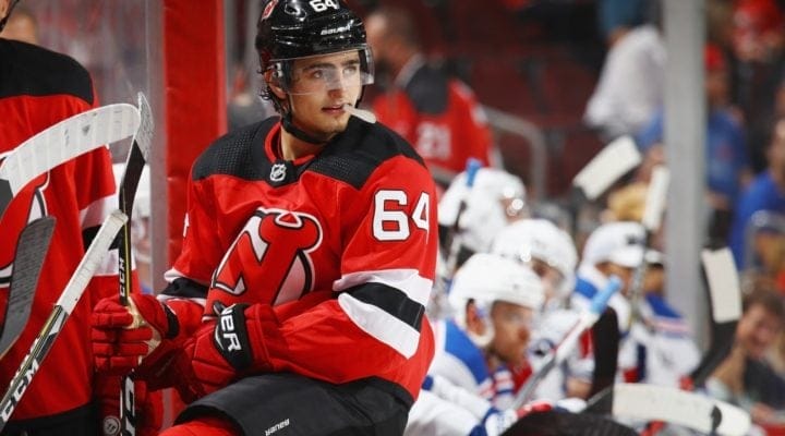 Joseph Blandisi #64 of the New Jersey Devils watches the play against the New York Rangers