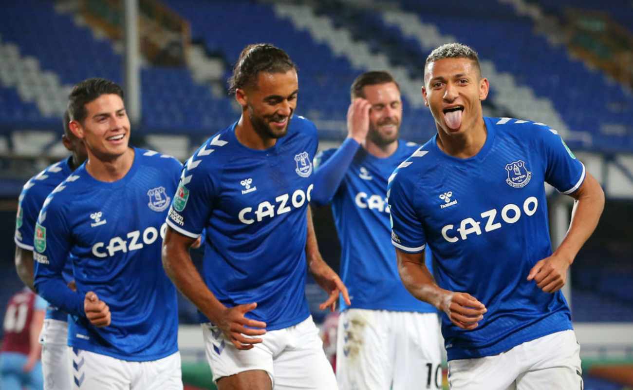 Everton’s Richarlison Stick His Tongue Out In Celebration With His Teammates After Scoring a Goal - Photo by ALEX LIVESEY/Getty Images