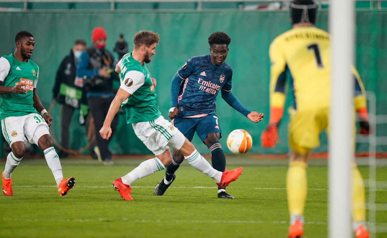 Bukayo Saka of Arsenal looks to put the ball towards goal - Photo by Chris Hofer/Getty Images