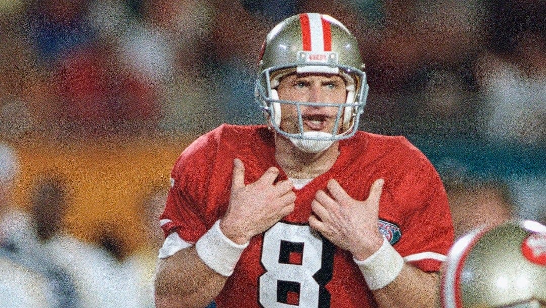 San Francisco 49ers quarterback Steve Young directs his team to a 49-26 victory over the San Diego Chargers in Super Bowl XXIX at Miami's Joe Robbie Stadium, Jan. 29, 1995. Young, who broke Joe Montana's Super Bowl record by throwing six touchdown passes, was voted MVP of the game.