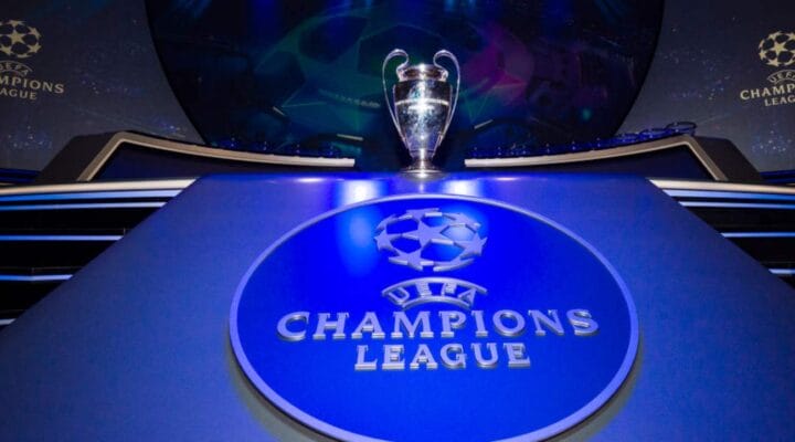 Alt: Champions League logo on a blue background - Photo by Visionhaus/Getty Images