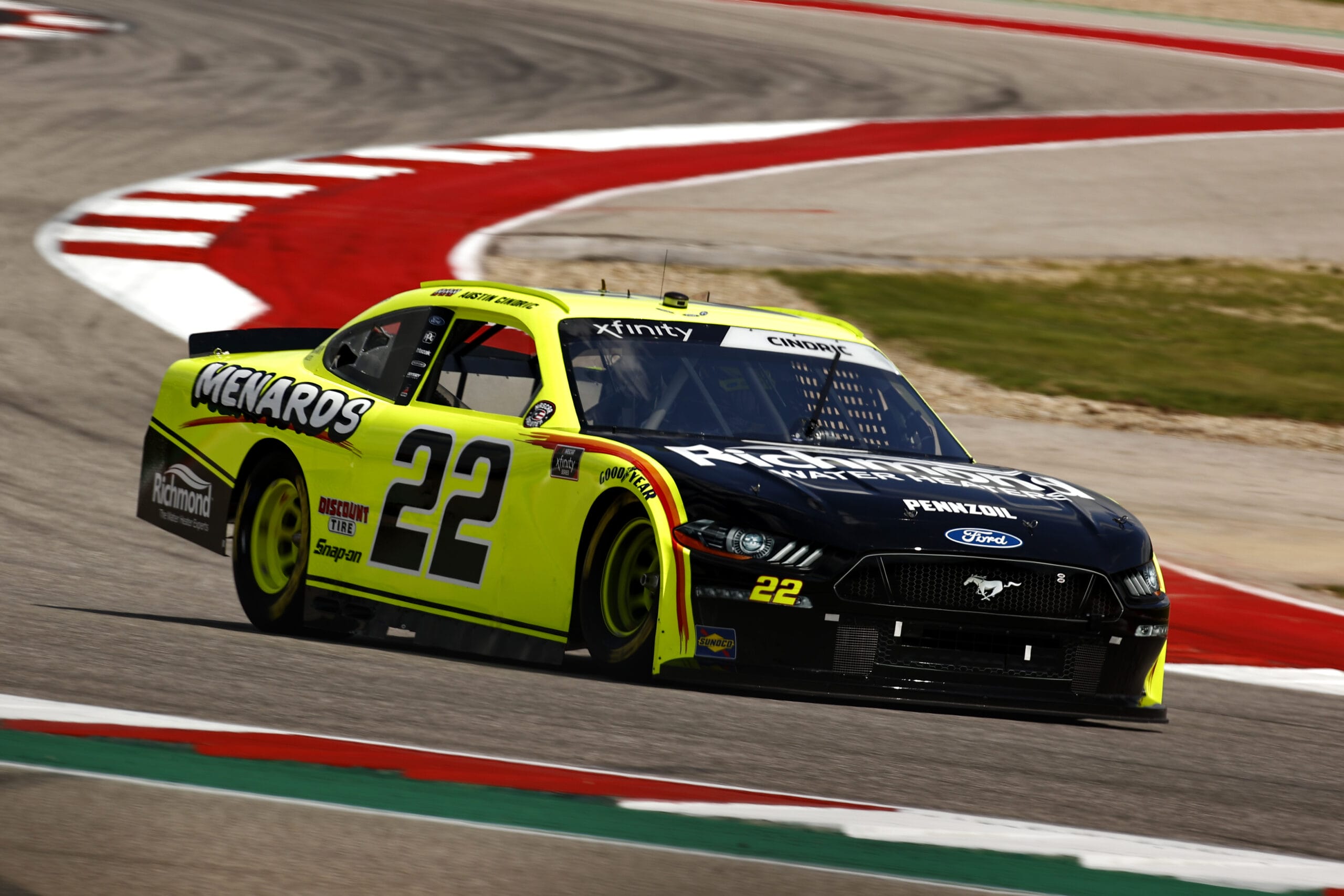 AUSTIN, TEXAS - MAY 21: Austin Cindric, driver of the #22 Menards/Richmond Ford, drives during practice for the NASCAR Xfinity Series Pit Boss 250 at Circuit of The Americas on May 21, 2021 in Austin, Texas.