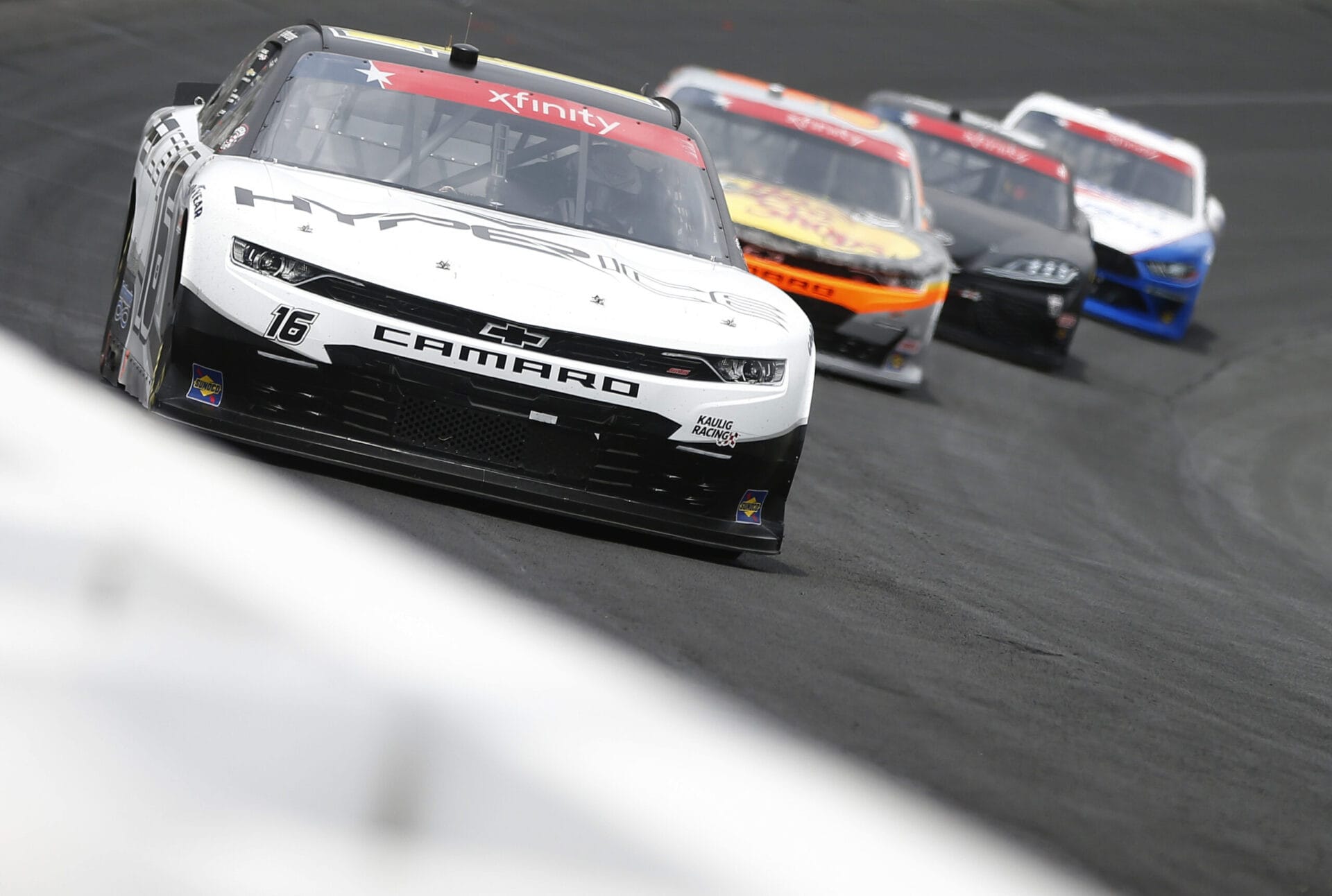 CONCORD, NORTH CAROLINA - MAY 29: AJ Allmendinger, driver of the #16 Hyperice Chevrolet, leads the field during the NASCAR Xfinity Series Alsco Uniforms 300 at Charlotte Motor Speedway on May 29, 2021 in Concord, North Carolina.