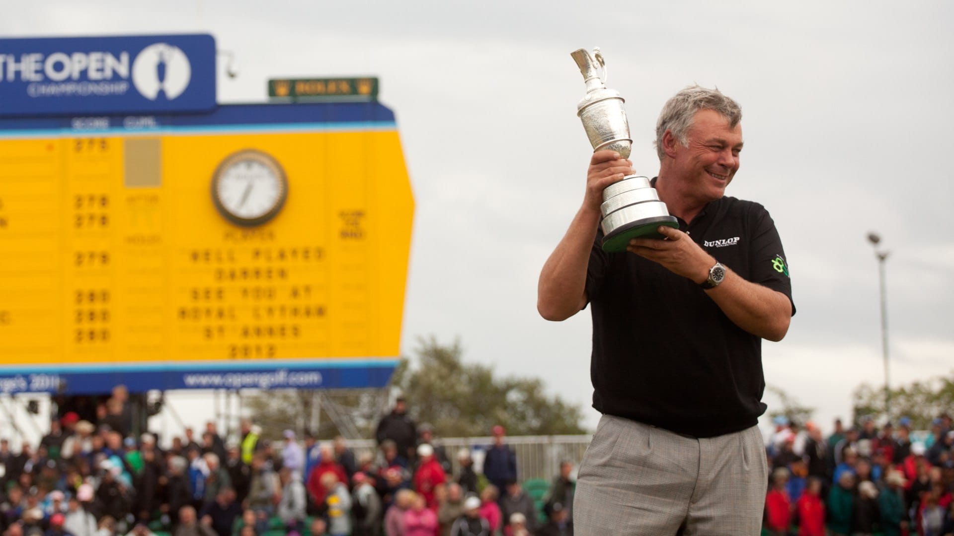 Darren Clarke of Northern Ireland holds the Claret Jug after winning the 2011 Open Championship at Royal St. George's Golf Club in Sandwich, England on July 17, 2011. (Photo by Darren Carroll/Getty Images)