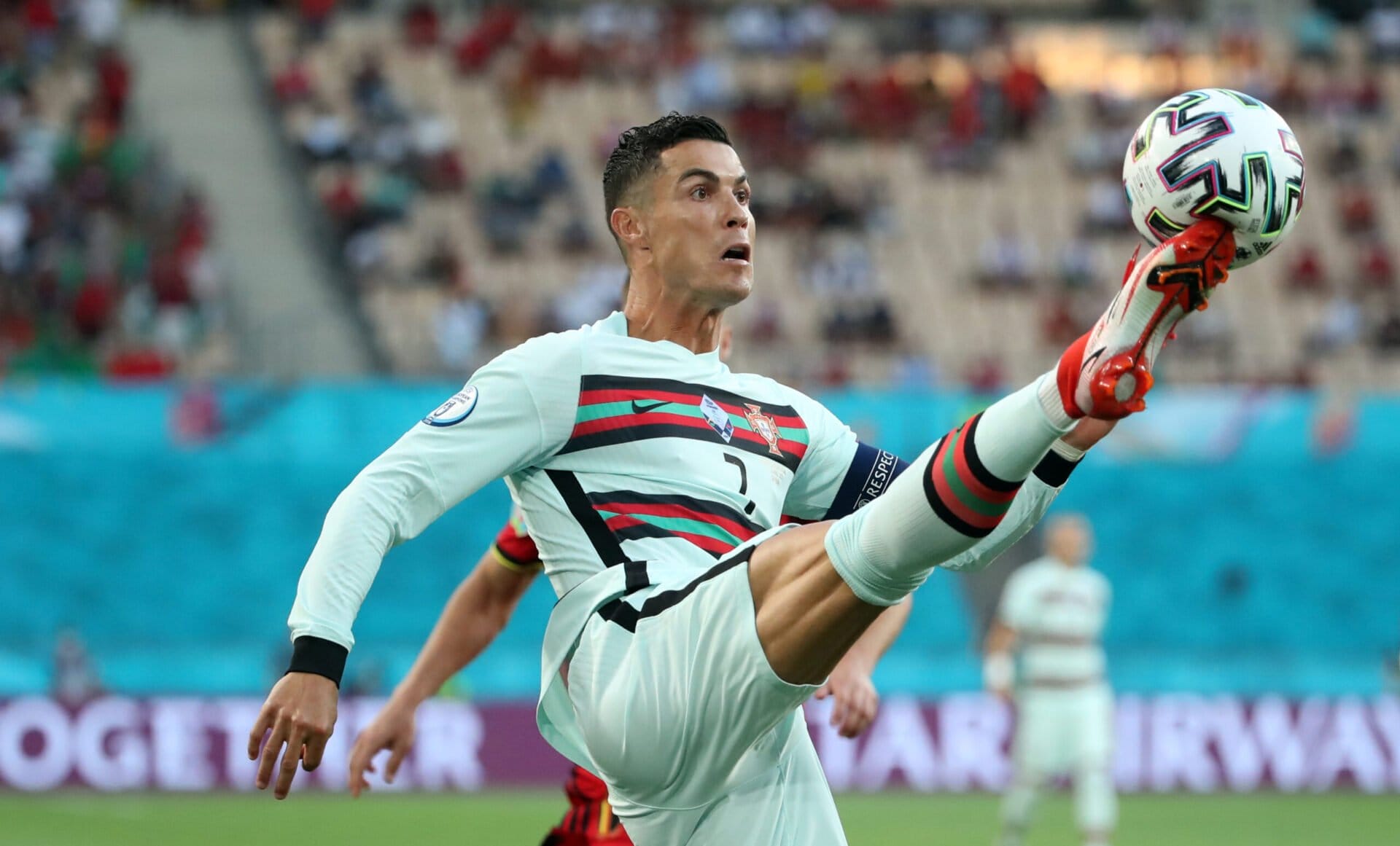 SEVILLE, SPAIN - JUNE 27: Cristiano Ronaldo of Portugal in action with the ball during the UEFA Euro 2020 Championship Round of 16 match between Belgium and Portugal at Estadio La Cartuja on June 27, 2021 in Seville, Spain.
