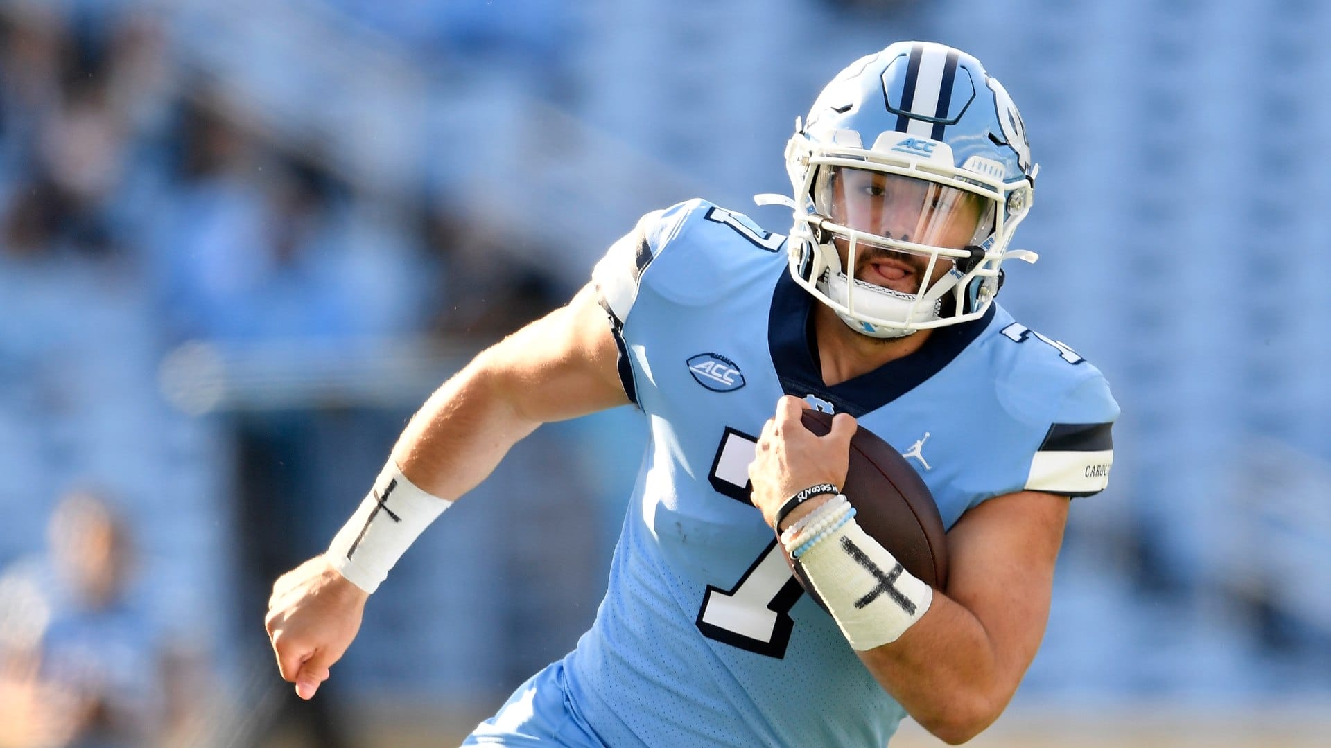 CHAPEL HILL, NORTH CAROLINA - NOVEMBER 14: Sam Howell #7 of the North Carolina Tar Heels scrambles against the Wake Forest Demon Deacons during their game at Kenan Stadium on November 14, 2020 in Chapel Hill, North Carolina. The Tar Heels won 59-53. (Photo by Grant Halverson/Getty Images)