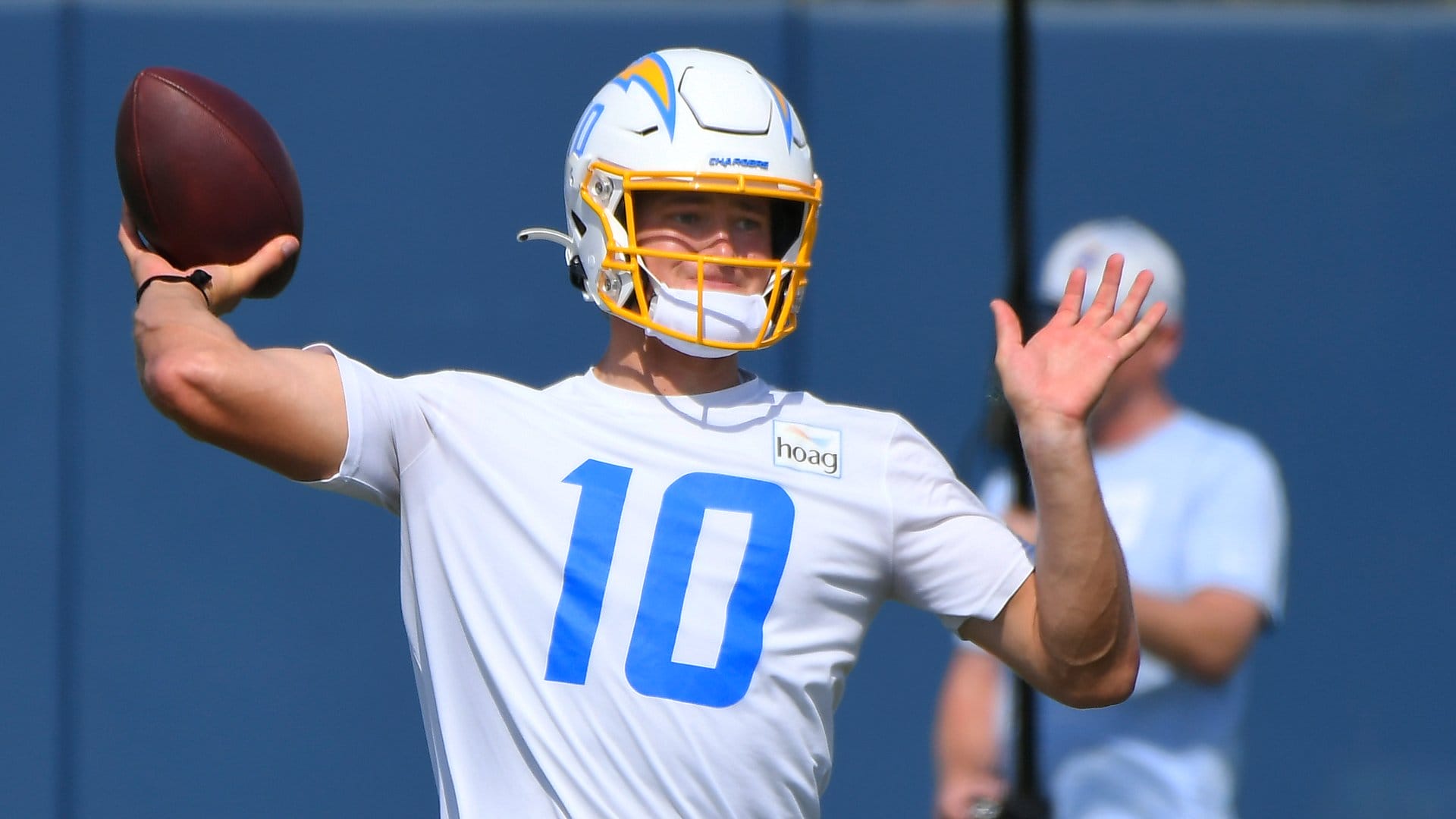 COSTA MESA, CA - JUNE 16: Justin Herbert #10 of the Los Angeles Chargers throws during mandatory minicamp at the Hoag Performance Center on June 16, 2021 in Costa Mesa, California. (Photo by John McCoy/Getty Images)
