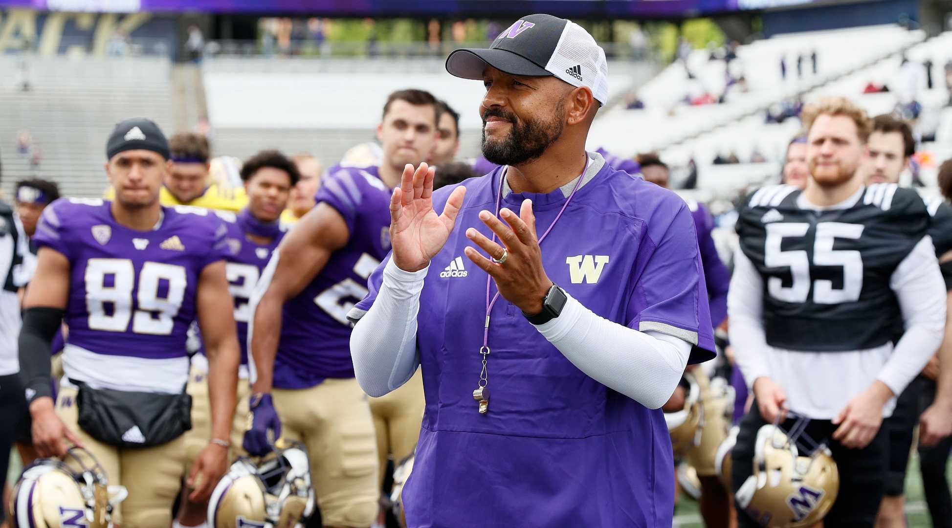 Head coach Jimmy Lake of the Washington Huskies gathers with his players after the spring game at Husky Stadium on May 01, 2021 in Seattle, Washington. (Photo by Steph Chambers/Getty Images)