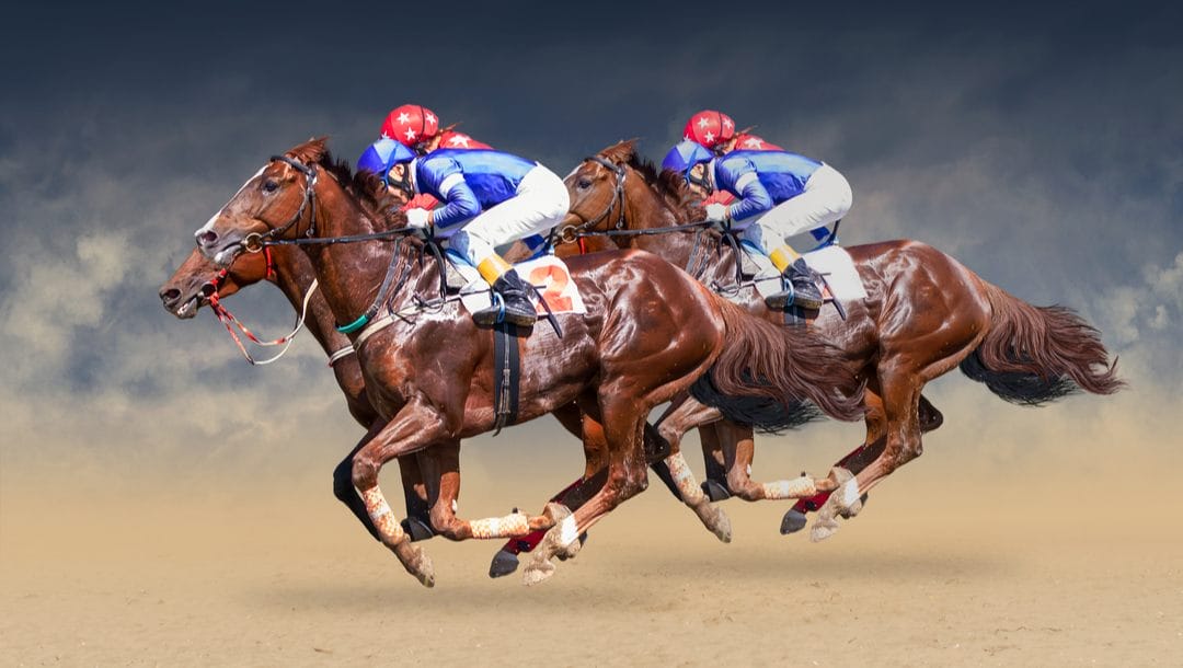 Four racing horses in fierce competition for the finish line.