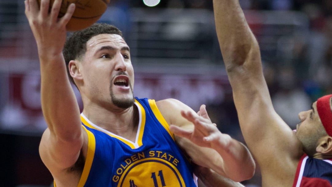 Klay Thompson drives to the hoop.