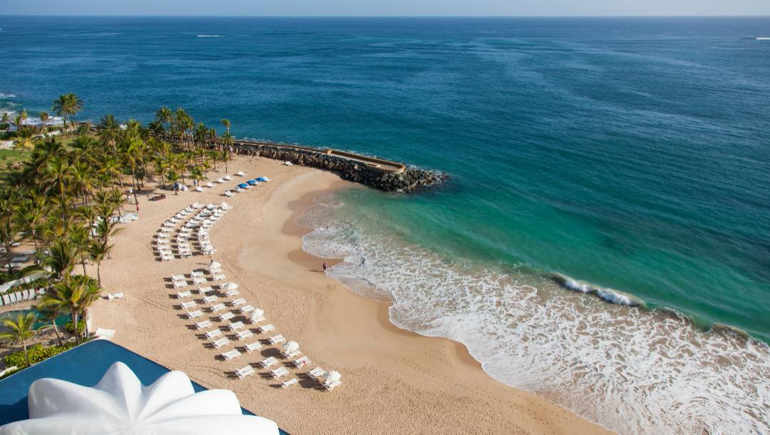 Aerial view of the La Concha Resort's Perla venue and beach access.
