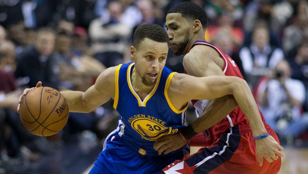 Golden State Warriors guard Stephen Curry gets around a defender in a recent game.