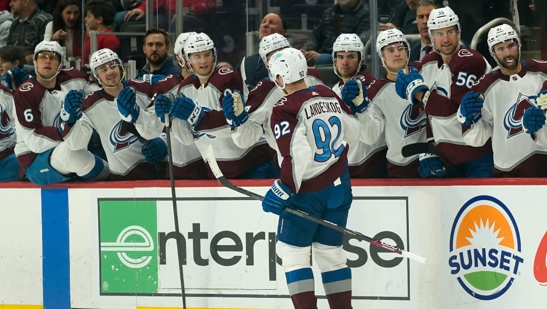 Colorado Avalanche left wing Gabriel Landeskog (92) celebrates his goal against the Detroit Red Wings in the first period of an NHL hockey game Wednesday, Feb. 23, 2022, in Detroit. (AP Photo/Paul Sancya)