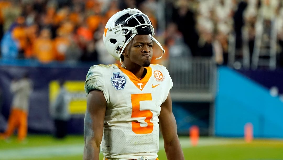 Tennessee quarterback Hendon Hooker reacts to a play on the field in the second half of the Music City Bowl NCAA college football game against Purdue Thursday, Dec. 30, 2019, in Nashville, Tenn. (AP Photo/Mark Humphrey)