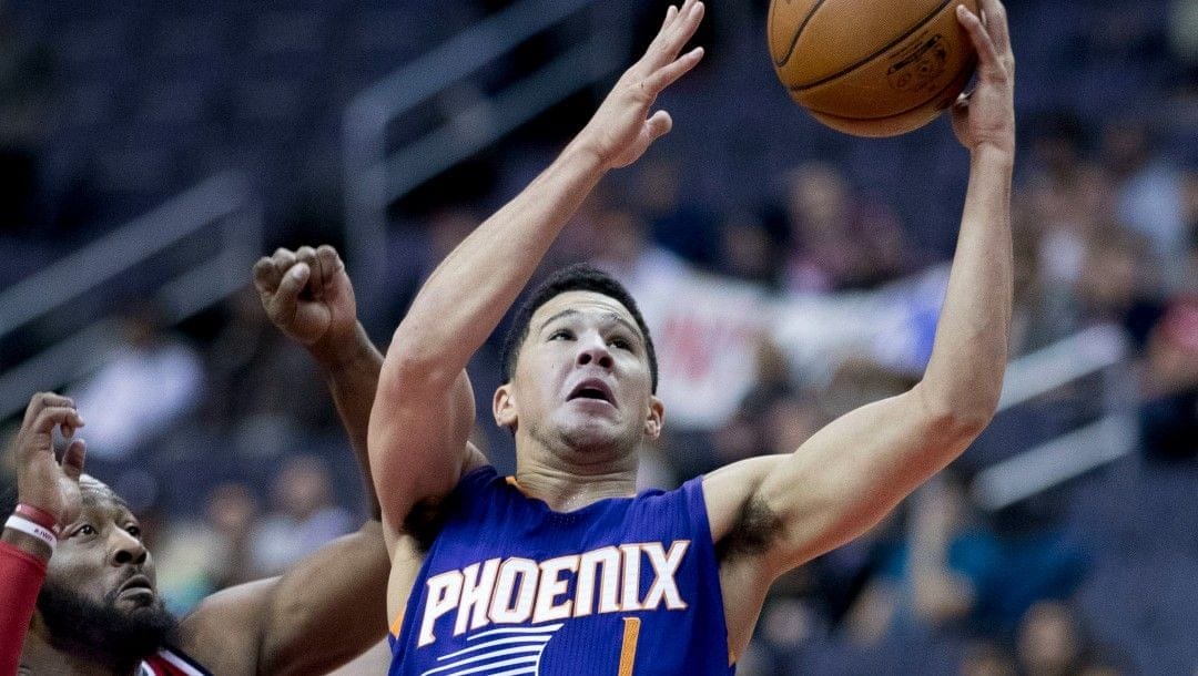 Devin Booker goes up for a layup in a recent game.
