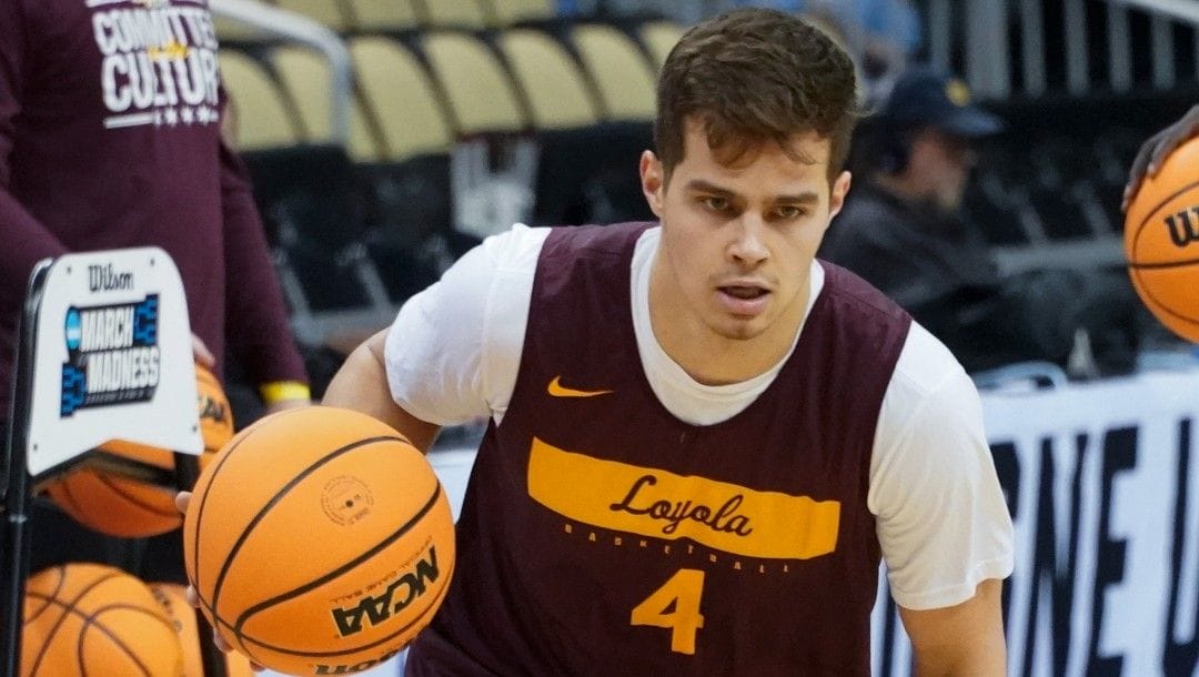 Loyola Chicago's Braden Norris drives to the hoop during practice for the first round of the NCAA men's college basketball tournament, Thursday, March 17, 2022, in Pittsburgh.
