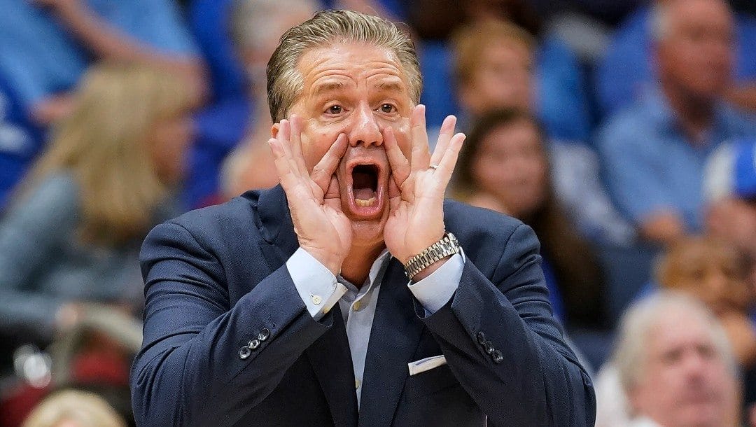 Kentucky coach John Calipari shouts at an official during the second half of the team's NCAA college basketball game against Vanderbilt in the Southeastern Conference men's tournament Friday, March 11, 2022.