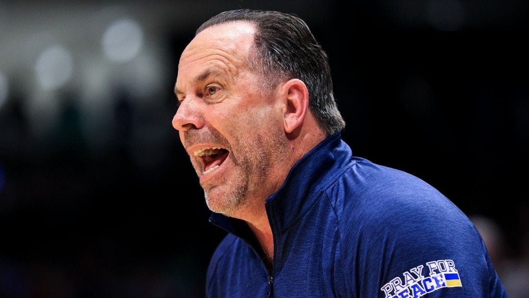 Notre Dame's head coach Mike Brey yells from the bench during a First Four game in the NCAA men's college basketball tournament against Rutgers, Wednesday, March 16, 2022, in Dayton, Ohio.