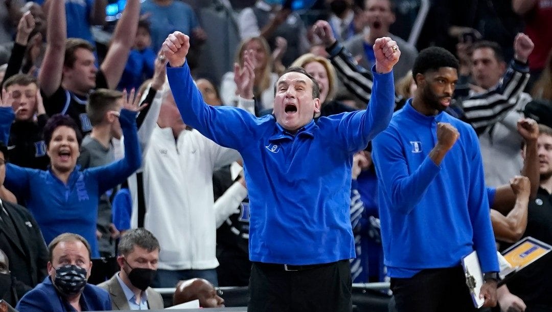 Duke head coach Mike Krzyzewski celebrates after his team defeated Texas Tech in a college basketball game in the Sweet 16 round of the NCAA tournament in San Francisco, Thursday, March 24, 2022.