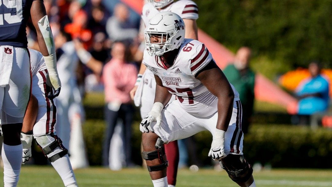 Mississippi State offensive lineman Charles Cross (67) lines up for the play against Auburn during the second half of an NCAA college football game Saturday, Nov. 13, 2021, in Auburn, Ala.