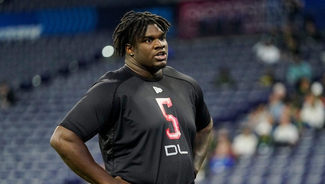 Georgia defensive lineman Jordan Davis (05) walks on the field at the NFL football scouting combine in Indianapolis, Saturday, March 5, 2022.