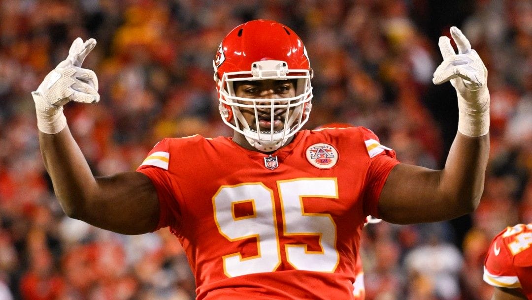 Kansas City Chiefs defensive end Chris Jones calls on the crowd to make noise during the second half of an NFL divisional playoff football game against the Buffalo Bills Sunday, Jan. 23, 2022.