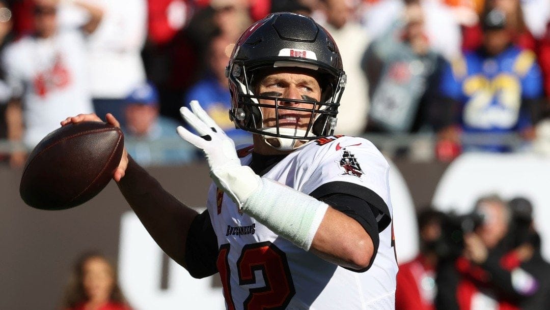 Tampa Bay Buccaneers quarterback Tom Brady (12) throws a pass against the Los Angeles Rams during the first half of an NFL divisional round playoff football game Jan. 23, 2022, in Tampa, Fla.