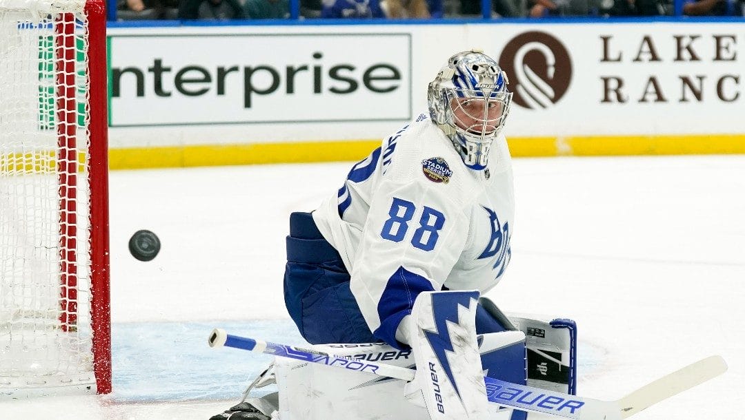 Tampa Bay Lightning goaltender Andrei Vasilevskiy (88) makes a save on a shot by the New York Rangers during the first period of an NHL hockey game Saturday, March 19, 2022, in Tampa, Fla.