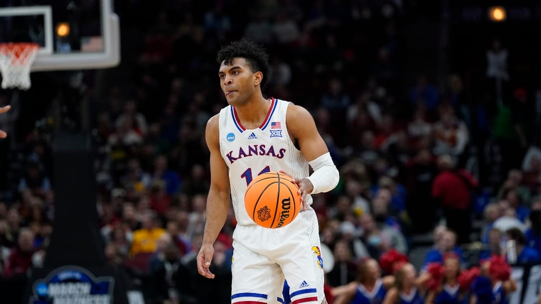 Kansas' Remy Martin during the first half of a college basketball game in the Sweet 16 round of the NCAA tournament Friday, March 25, 2022, in Chicago. (AP Photo/Charles Rex Arbogast)