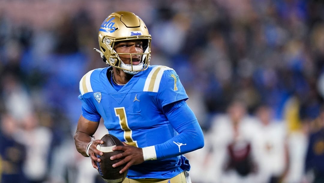 FILE - UCLA quarterback Dorian Thompson-Robinson pulls back to throw a pass during the first half of an NCAA college football game against California on Nov. 27, 2021, in Pasadena, Calif. Thompson-Robinson was voted to The Associated Press All Pac-12 team on Friday, Dec. 10. (AP Photo/Jae C. Hong, File)