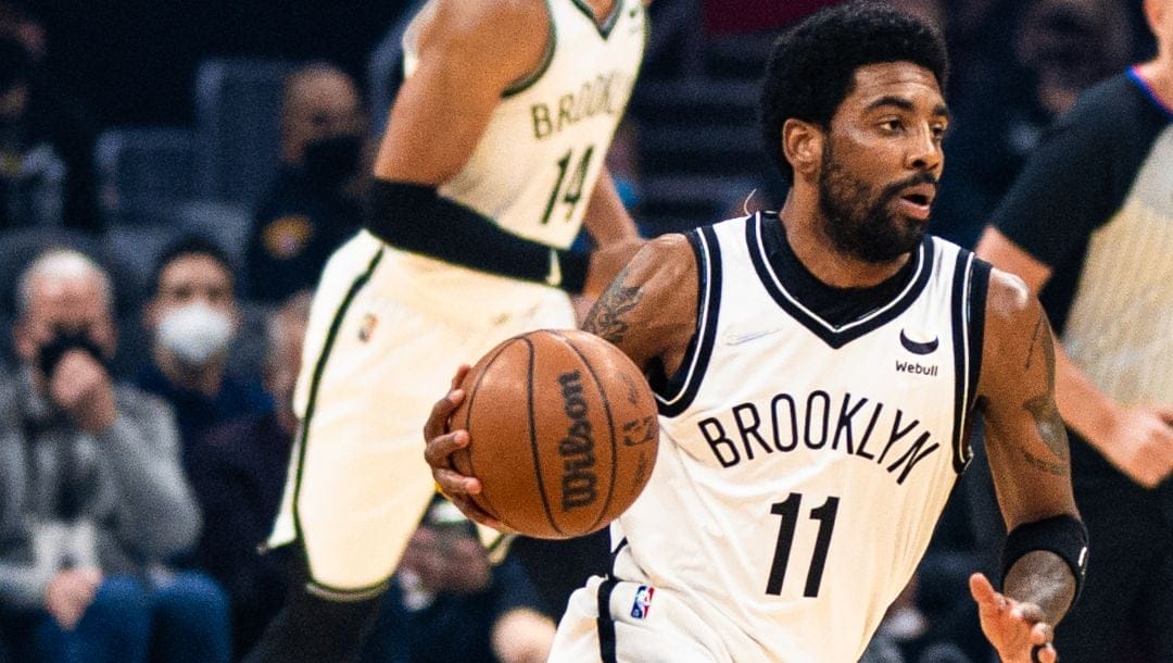 Kyrie Irving of the Brooklyn Nets drives to the hoop in a recent game.