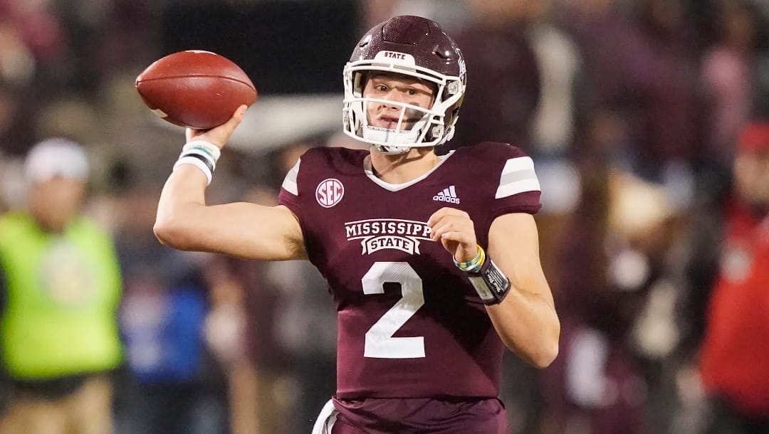 Mississippi State quarterback Will Rogers (2) passes against Mississippi during the first half of an NCAA college football game, Thursday, Nov. 25, 2021, in Starkville, Miss. Mississippi won 31-21. (AP Photo/Rogelio V. Solis)