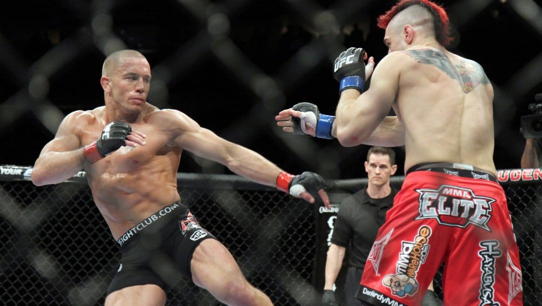 Georges St. Pierre, left, in action against Dan Hardy in their UFC 111 fight at the Prudential Center in Newark, NJ on March 27, 2010.