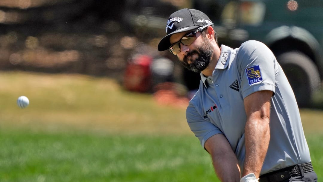 Adam Hadwin, of Canada, hits from the fringe on the second hole during the final round of the Valspar Championship golf tournament Sunday, March 20, 2022, at Innisbrook in Palm Harbor, Fla. (AP Photo/Chris O'Meara)