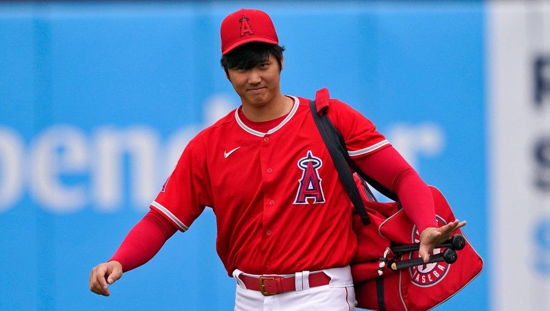 Los Angeles Angels' Shohei Ohtani arrives prior to a spring training baseball game against the Oakland Athletics, Monday, March 28, 2022, in Tempe, Ariz.