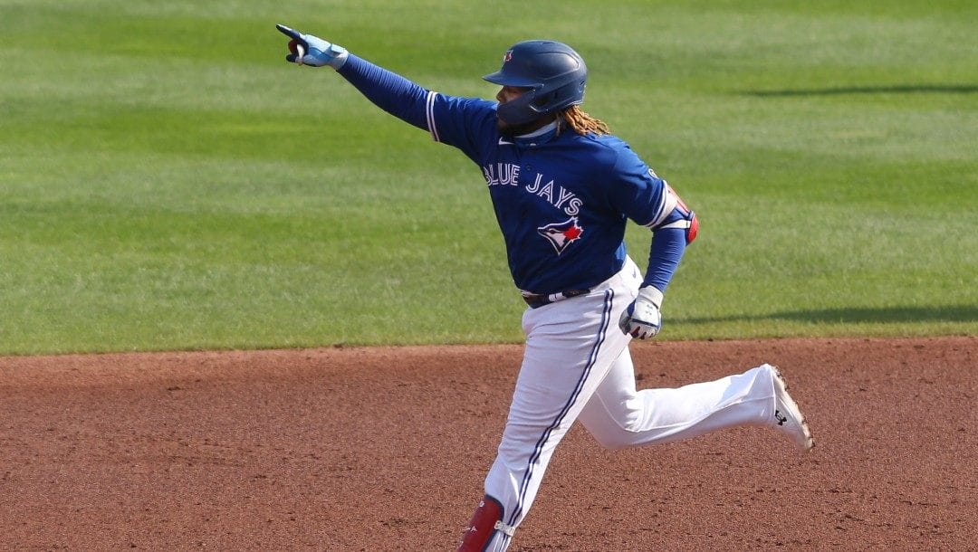 Toronto Blue Jays Vladimir Guerrero Jr. celebrates his home run against Baltimore Orioles pitcher Keegan Akin during the third inning of a baseball game, Sunday, Sept. 27, 2020, in Buffalo, N.Y.