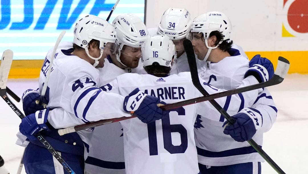 Toronto Maple Leafs celebrate a goal by Toronto Maple Leafs right wing William Nylander (88) during the first period of an NHL hockey game against the Florida Panthers, Tuesday, April 5, 2022, in Sunrise, Fla. (AP Photo/Rebecca Blackwell)