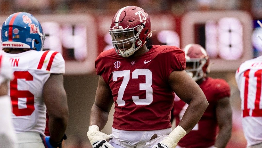 Alabama offensive lineman Evan Neal (73) waits for the play against Mississippi during the second half of an NCAA college football game, Saturday, Oct. 2, 2021, in Tuscaloosa, Ala.