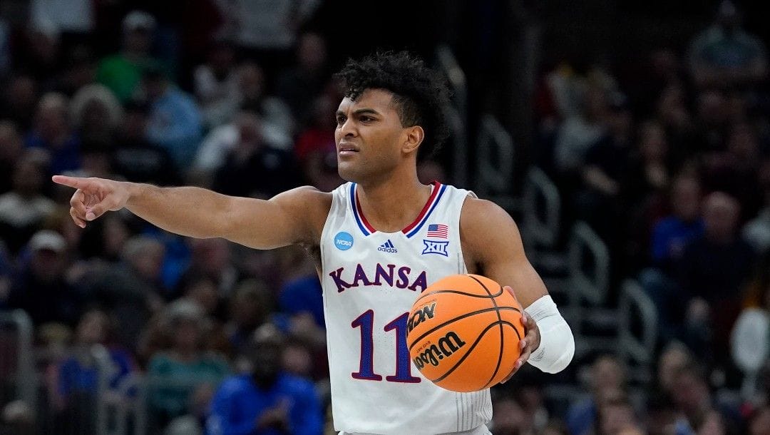 Kansas' Remy Martin during the first half of a college basketball game in the Sweet 16 round of the NCAA tournament Friday, March 25, 2022, in Chicago.