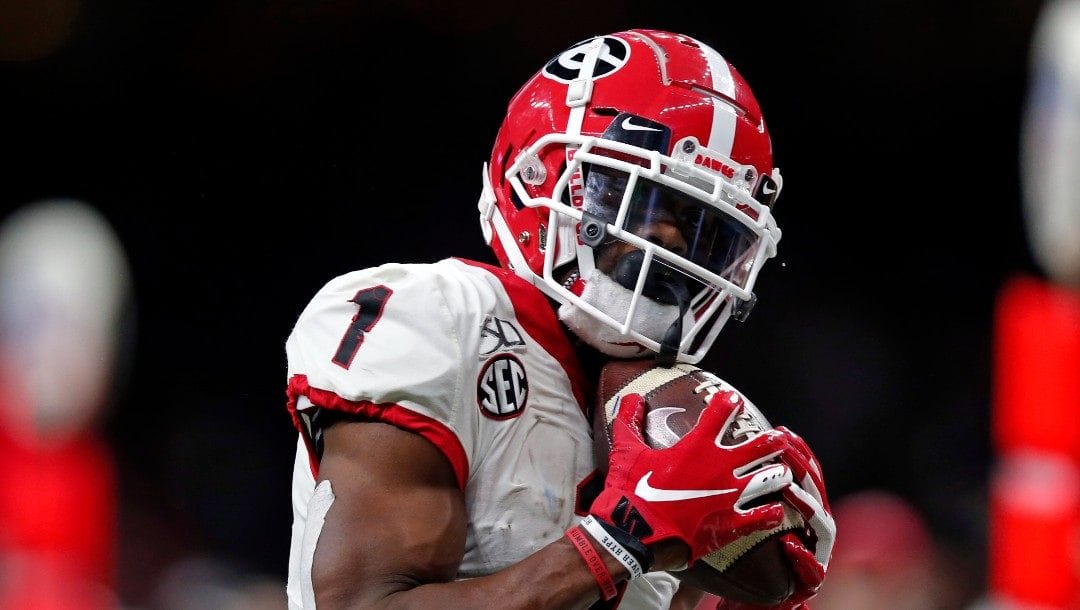In this Jan. 1, 2020, file photo, Georgia wide receiver George Pickens (1) pulls in a touchdown pass in the first half of the Sugar Bowl NCAA college football game against Baylor in New Orleans.