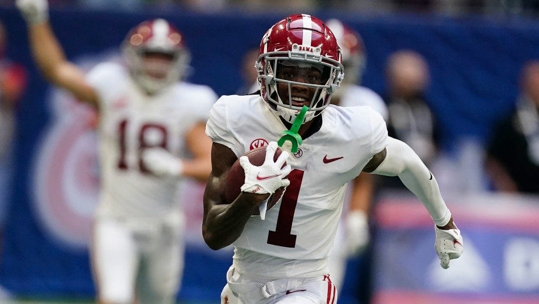 Alabama wide receiver Jameson Williams (1) scores a touchdown against the Miami during an NCAA college football game Saturday, Sept. 4, 2021, in Atlanta. Alabama plays Georgia in the College Football Playoff national championship game on Jan. 10, 2022.