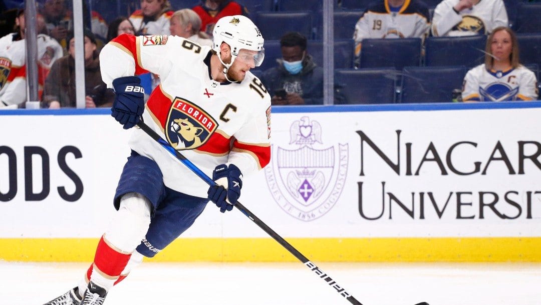 Florida Panthers center Aleksander Barkov (16) controls the puck during the second period of an NHL hockey game against the Buffalo Sabres, Monday, March 7, 2022, in Buffalo, N.Y.