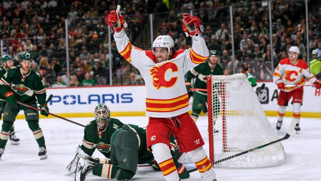 Calgary Flames left wing Johnny Gaudreau celebrates his goal on Minnesota Wild goalie Cam Talbot during the second period of an NHL hockey game Thursday, April 28, 2022, in St. Paul, Minn.