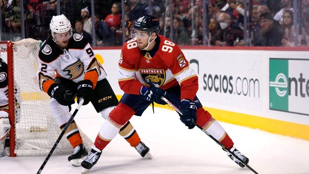 Florida Panthers center Maxim Mamin (98) skates with the puck as Anaheim Ducks defenseman Andrej Sustr (92) defends during the second period of an NHL hockey game Tuesday, April 12, 2022, in Sunrise, Fla.