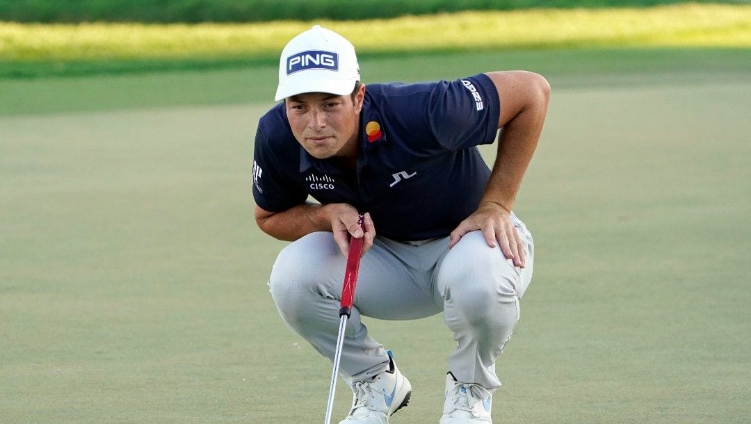 Viktor Hovland, of Norway, lines up a shot on the 17th green during the third round of the Arnold Palmer Invitational golf tournament Saturday, March 5, 2022, in Orlando, Fla.