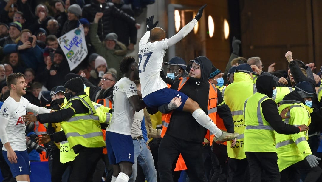 Tottenham players celebrate their victory during the English Premier League soccer match between Leicester City and Tottenham Hotspur at King Power stadium in Leicester, England, Wednesday, Jan. 19, 2022.